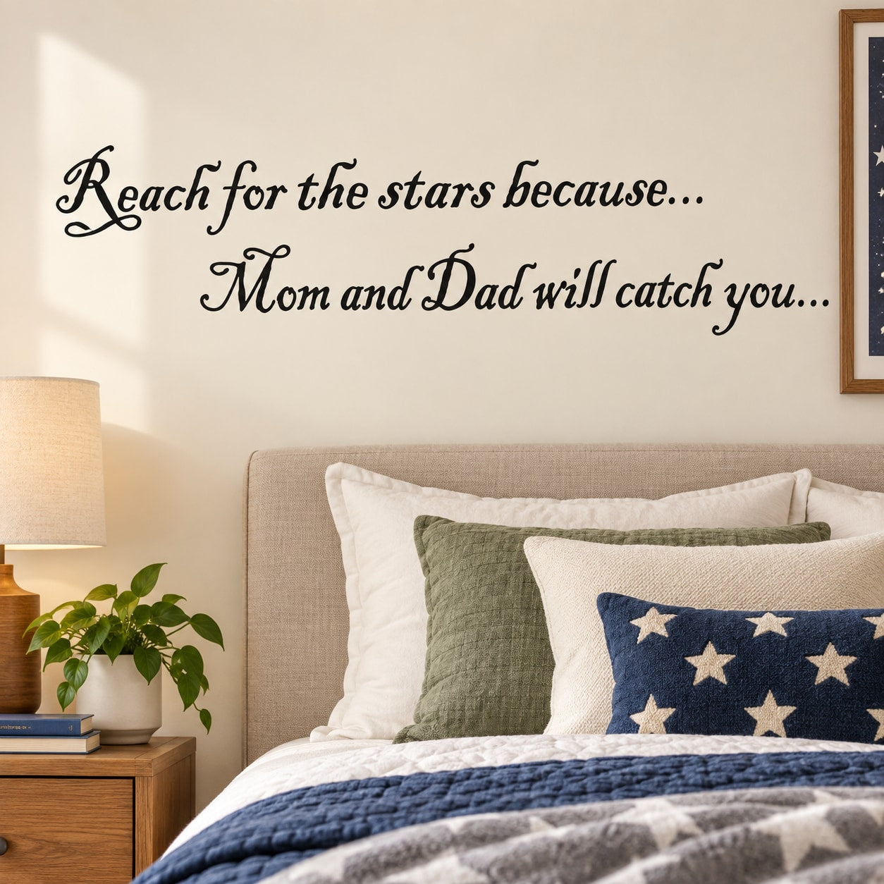 Wall decal with cursive quote: Reach for the stars; Mom and Dad will catch you