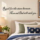 Wall decal with cursive quote: Reach for the stars; Mom and Dad will catch you