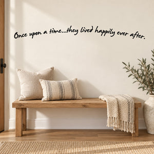 Wall decal with cursive quote: “Once upon a time...they lived happily ever after”
