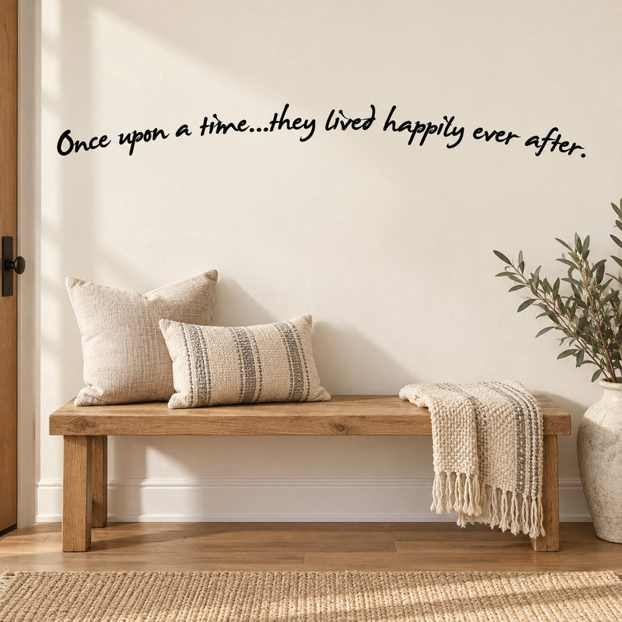 Wall decal with cursive quote: “Once upon a time...they lived happily ever after”