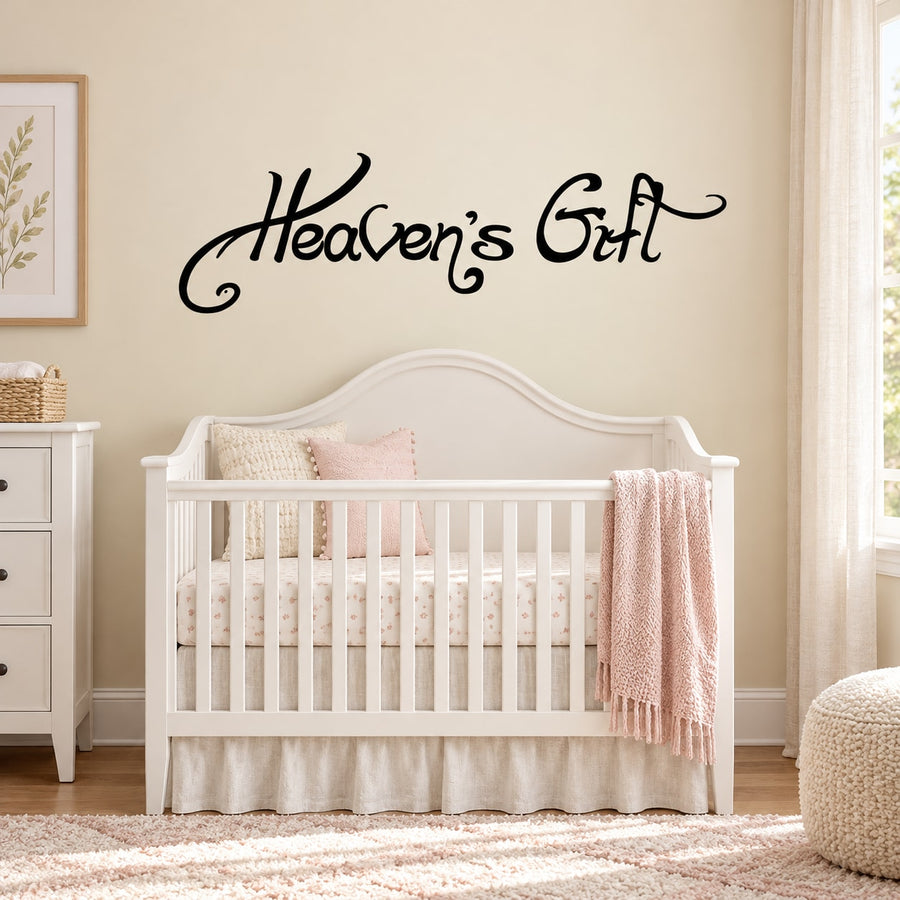 Wall decal with black cursive text 'Heaven's Gift'