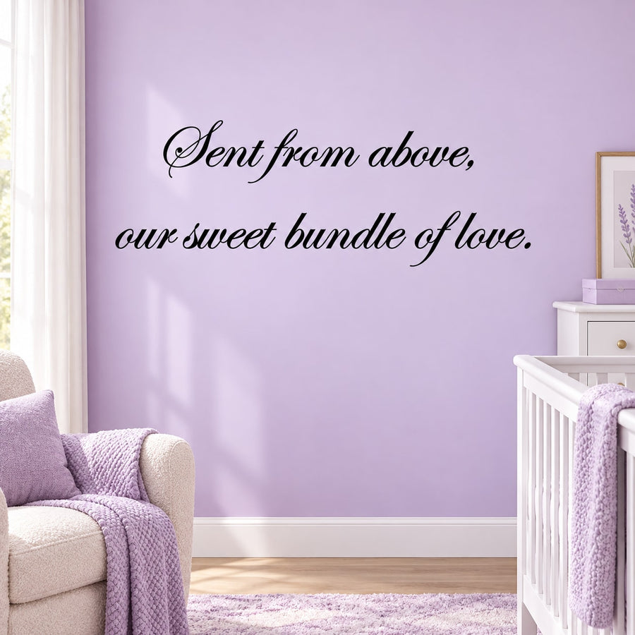Cursive wall decal quote: “Sent from above, our sweet bundle of love.”