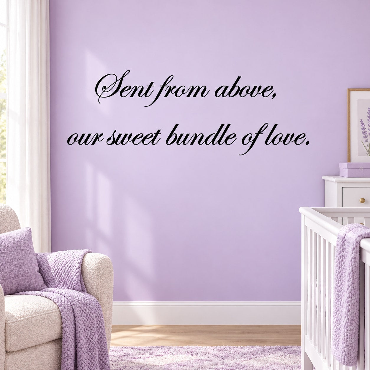 Cursive wall decal quote: “Sent from above, our sweet bundle of love.”