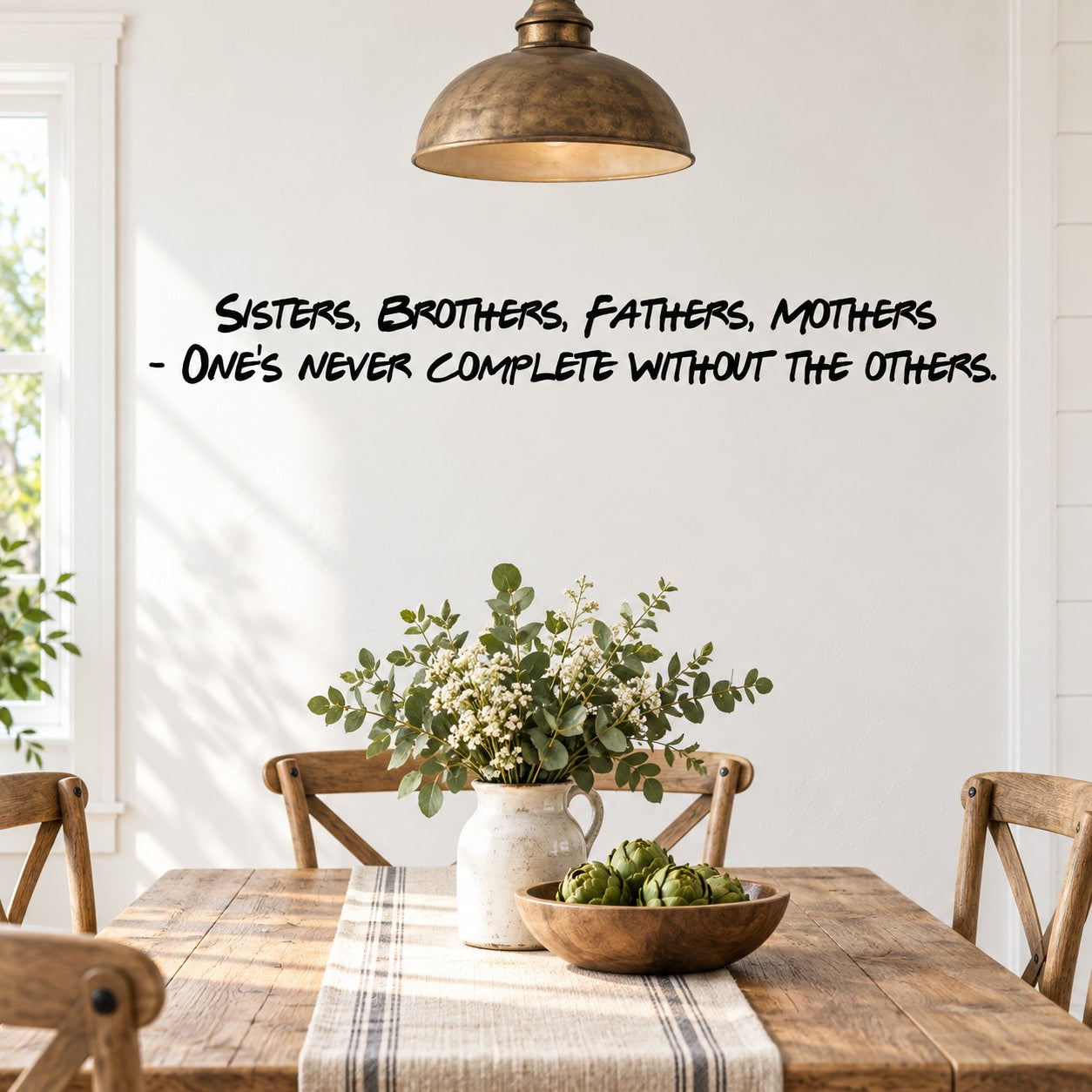 Wall decal quote: “Sisters, Brothers, Fathers, Mothers” and “One's never complete without others.”