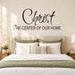 Christ wall scripture decal reading “THE CENTER OF OUR HOME” in black and cream