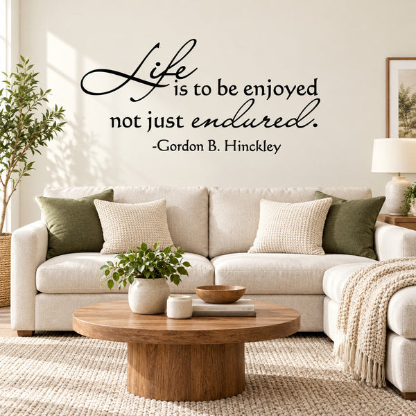 Black script quote wall decal: “Life is to be enjoyed, not just endured.”