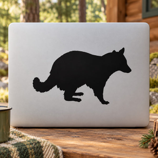 Raccoon observing wall decal with black raccoon silhouette on light gray background