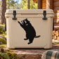 Leaping raccoon decal, black silhouette on beige rectangular surface