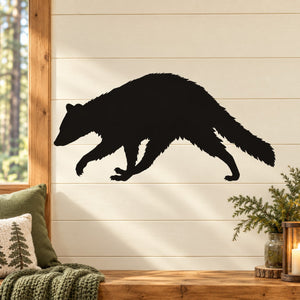 Black raccoon silhouette decal in hustling pose, bold graphic outline.