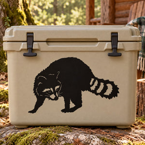 Beige hard cooler with black raccoon decal on front