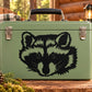 Fuzzy raccoon head decal with black fur and green highlights