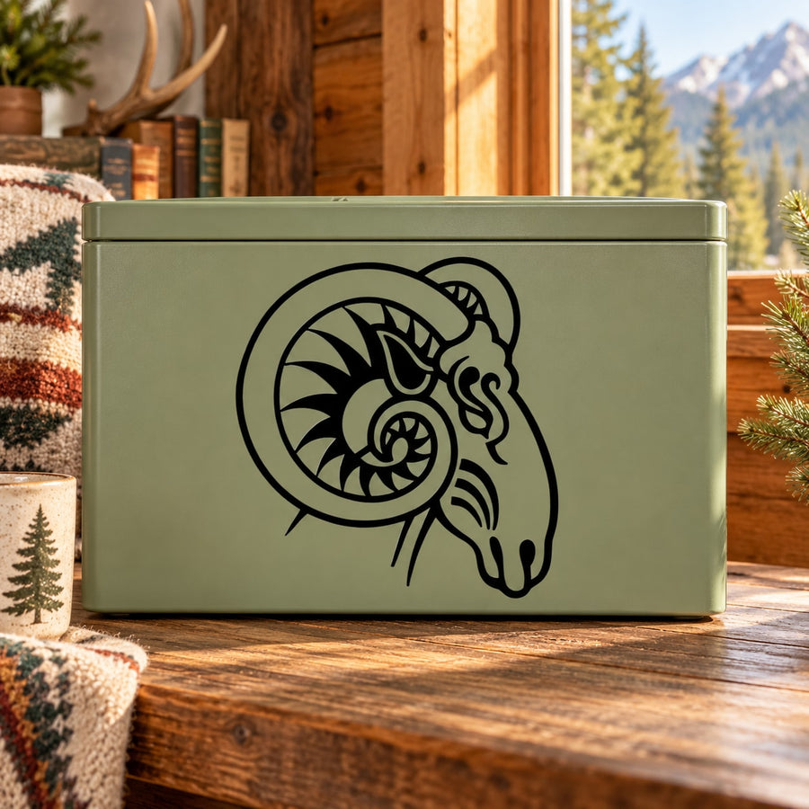 Ram head decal with circular horned outline on dark green surface