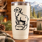 White tumbler with black ram standing on rock decal