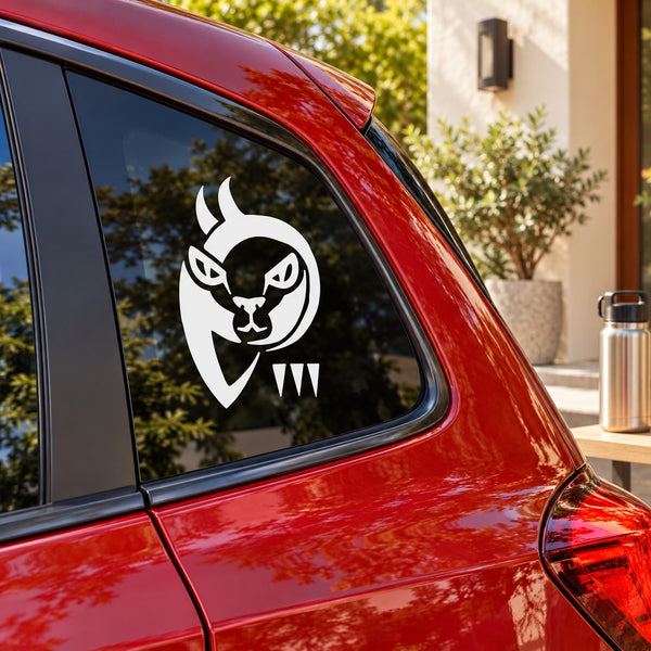 Abstract cat face decal sticker on a car window, white cat design with bow tie