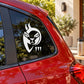 Abstract cat face decal sticker on a car window, white cat design with bow tie