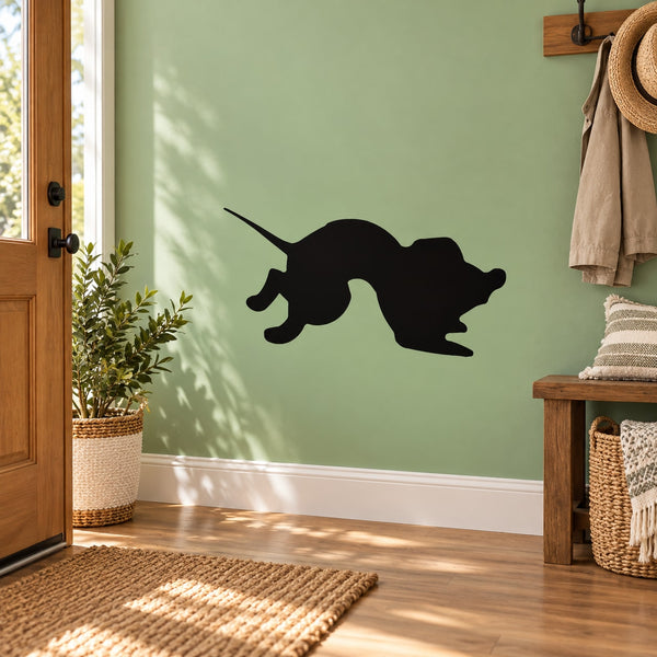 Basset hound silhouette decal, black dog graphic on a smooth wall surface