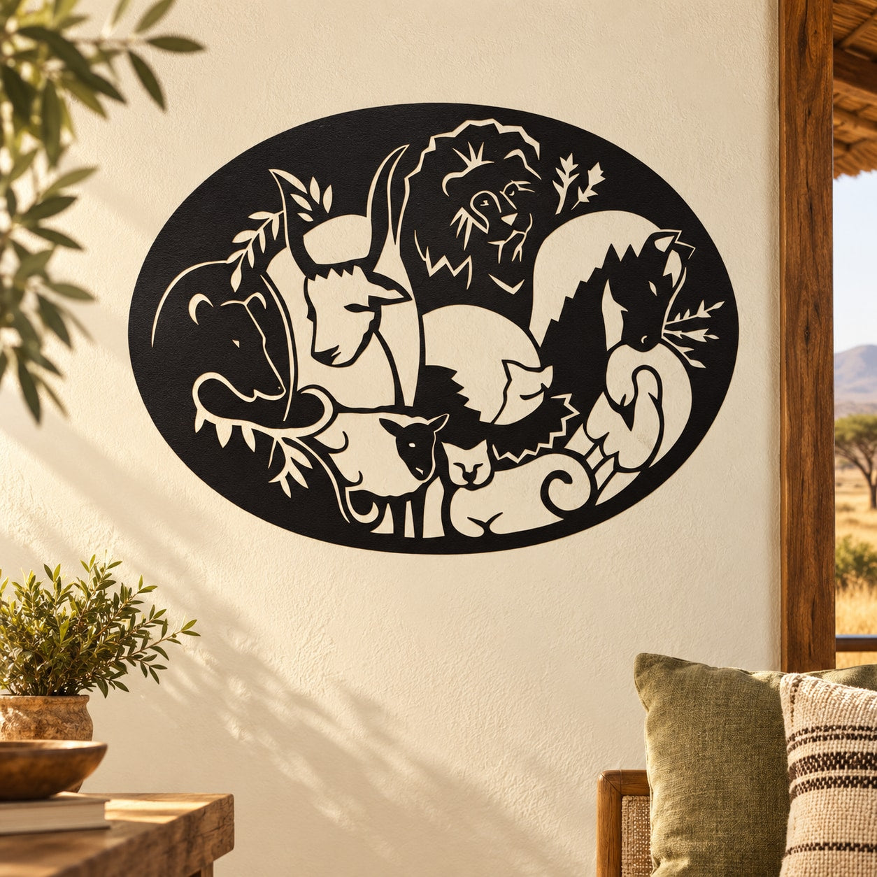 Animal motif oval decal with black background and white animal silhouettes