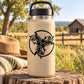 Beige insulated water bottle with black interlocking goat head circle decal
