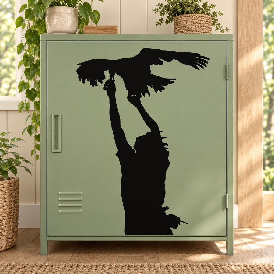 Black falconer silhouette decal with wings-out bird