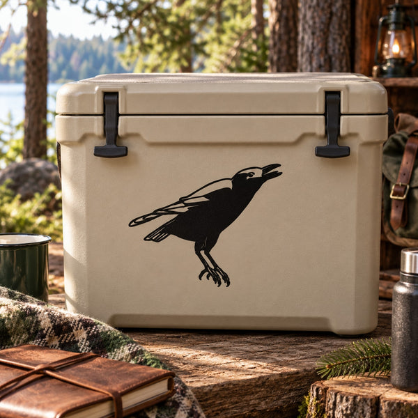 Black crow decal sticker on light tan cooler