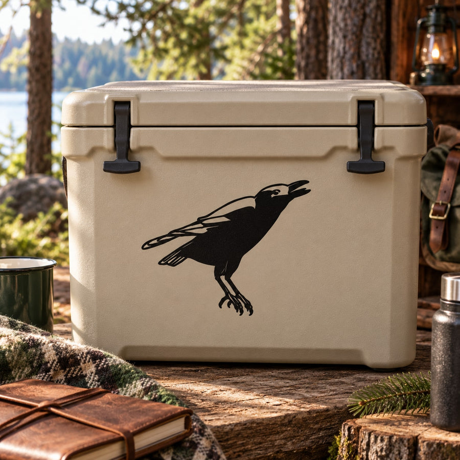 Black crow decal sticker on light tan cooler