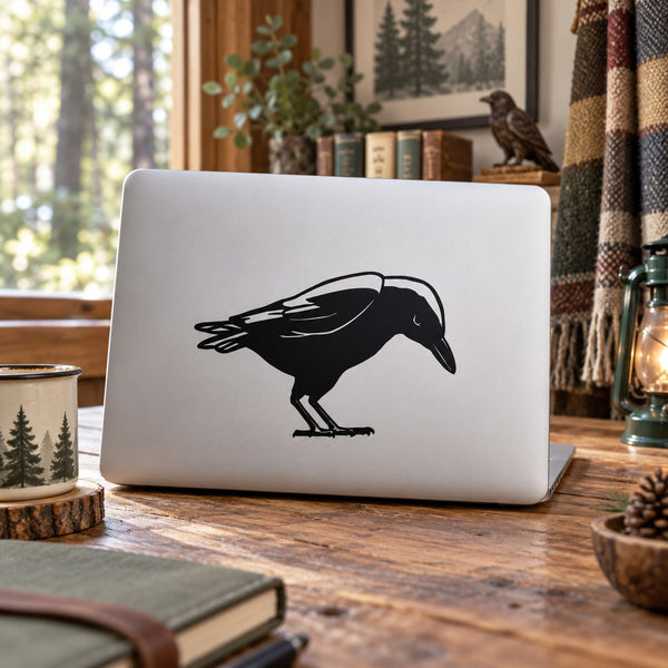 Crow watching decal with black crow silhouette on a white surface