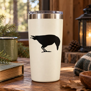 Pecking crow silhouette decal on white tumbler, black bird graphic centered