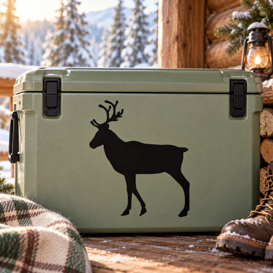Reindeer silhouette decal on green surface, staring buck profile