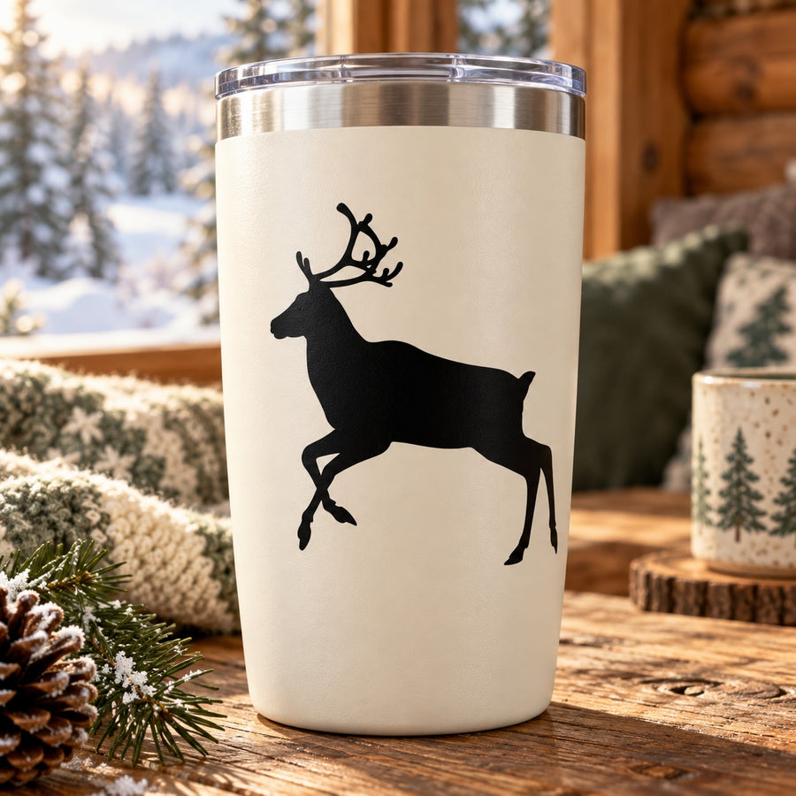 White tumbler with black reindeer running decal