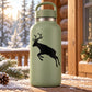 Green insulated bottle with black leaping reindeer decal