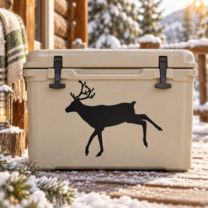 Reindeer decal with black reindeer silhouette on light surface