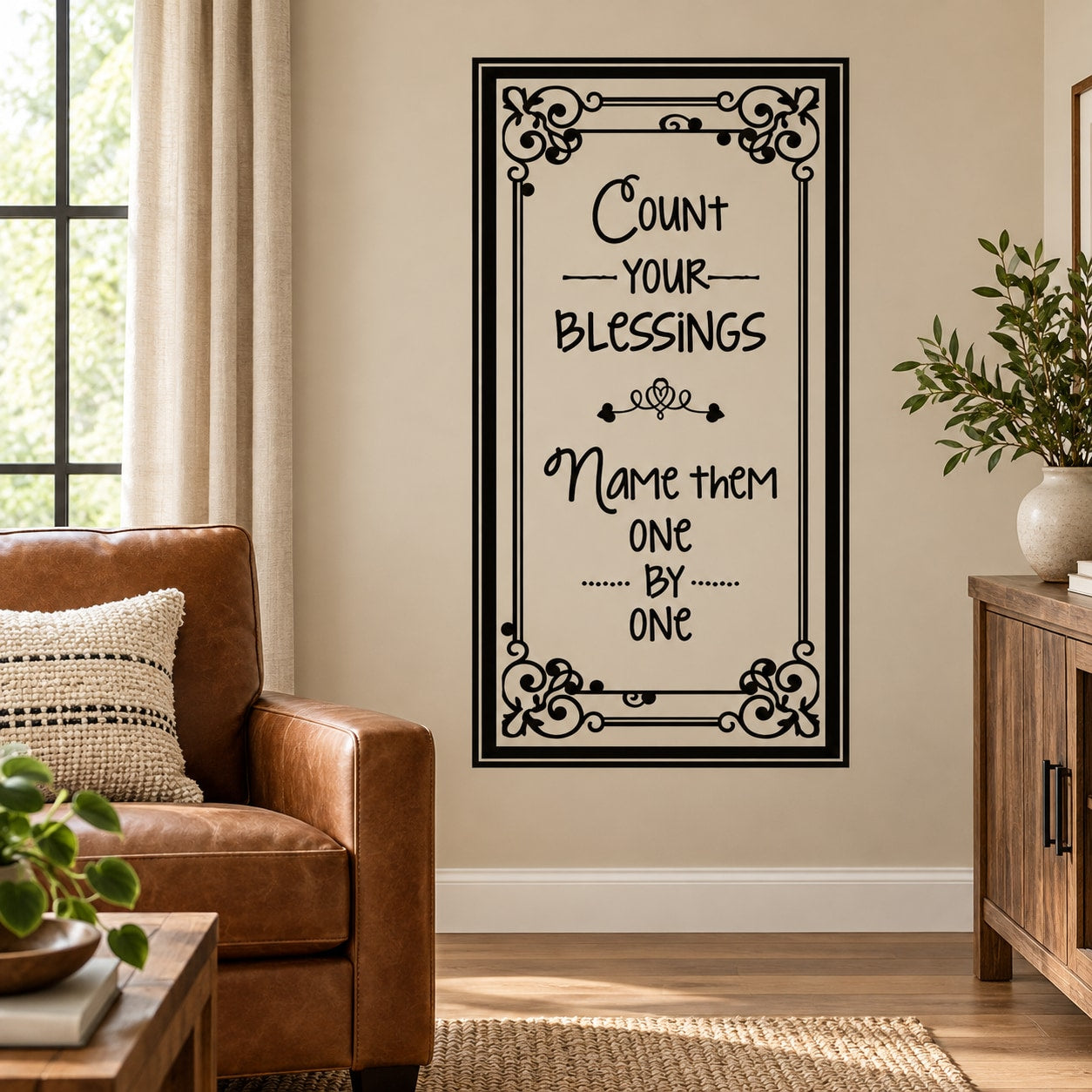 Wall decal with black ornate border and quote: Count your blessings, name them one by one.