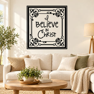 Square wall decal with black border and 'I believe in Christ' lettering, floral corner accents.