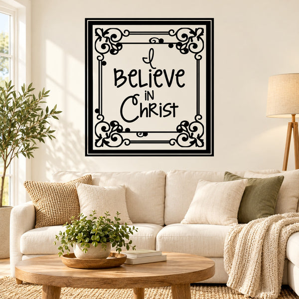 Square wall decal with black border and 'I believe in Christ' lettering, floral corner accents.