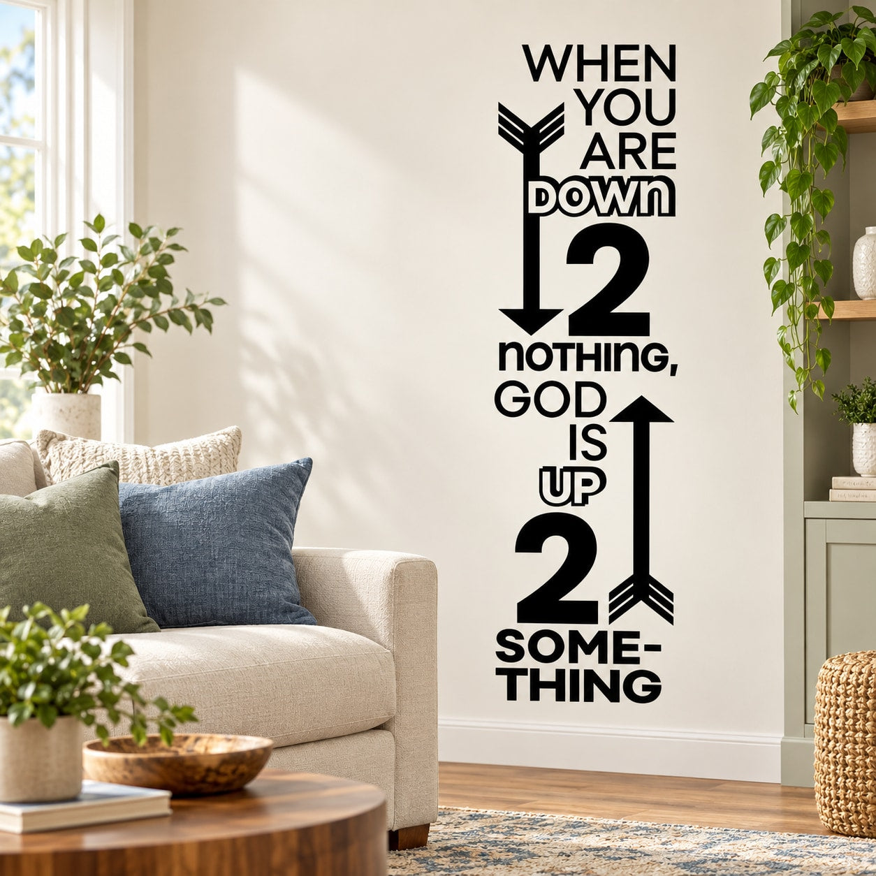 Black wall decal with arrowed quote: “When you are down… God is up… some thing”