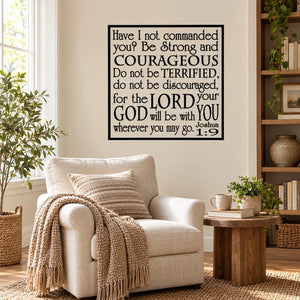 Joshua 1:9 quote wall decal in black-bordered text box on white.