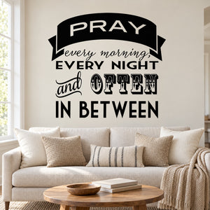 Black circular wall decal with white text: PRAY every morning, every night, often in between.