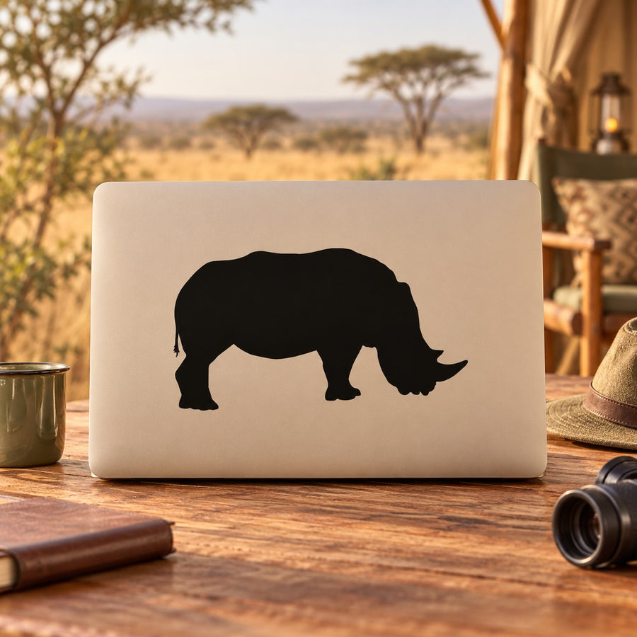 Black rhino grazing silhouette decal on a rectangular light backing