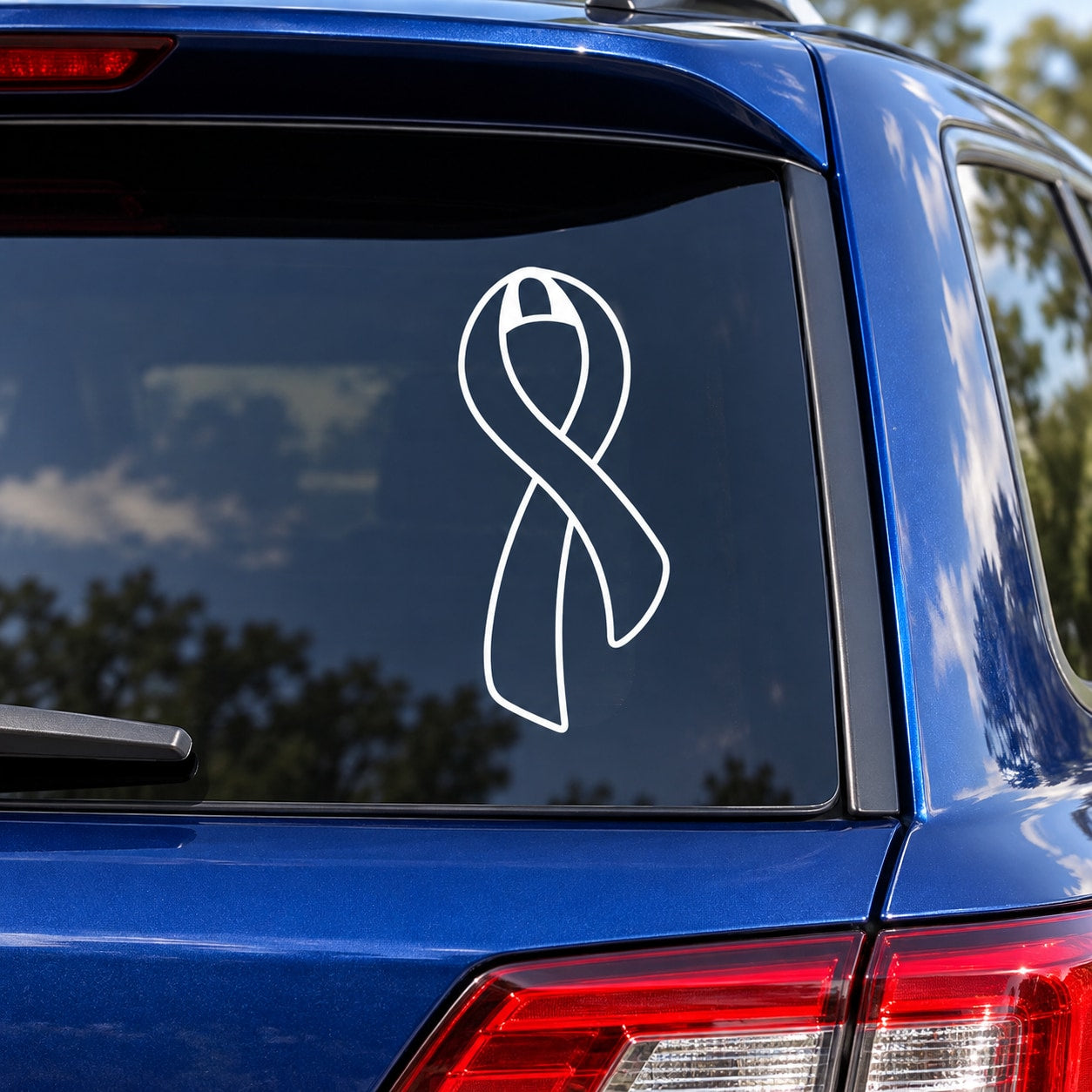 Curvy ribbon outline decal, white on car rear window