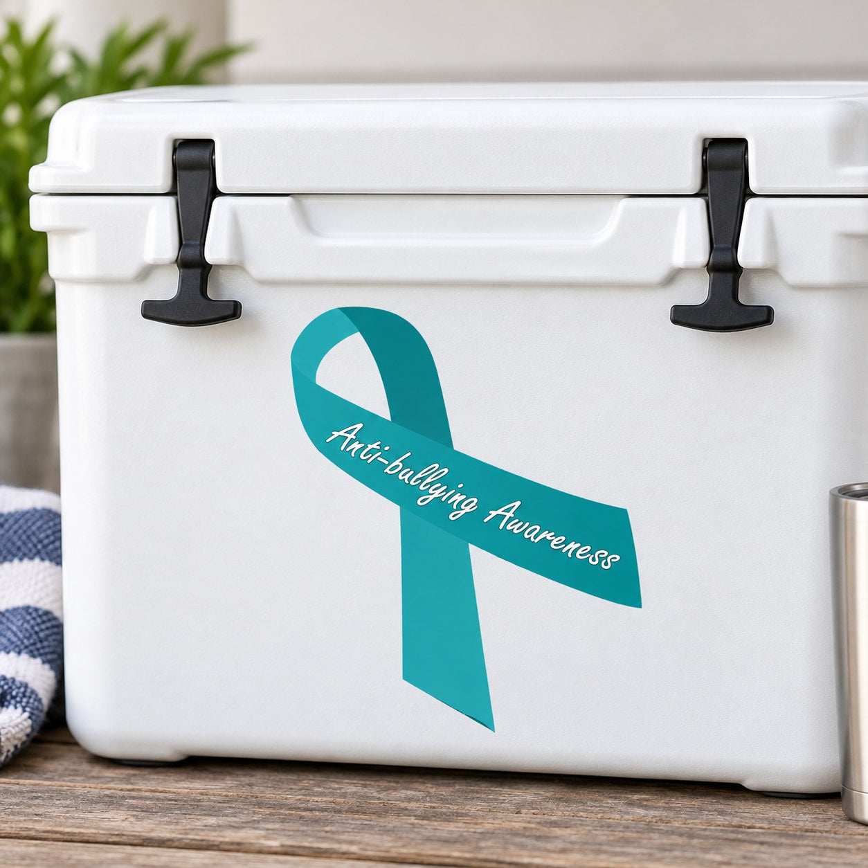 Teal awareness ribbon sticker with white 'Antibullying Awareness' text