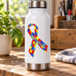 White insulated water bottle with colorful autism puzzle ribbon decal