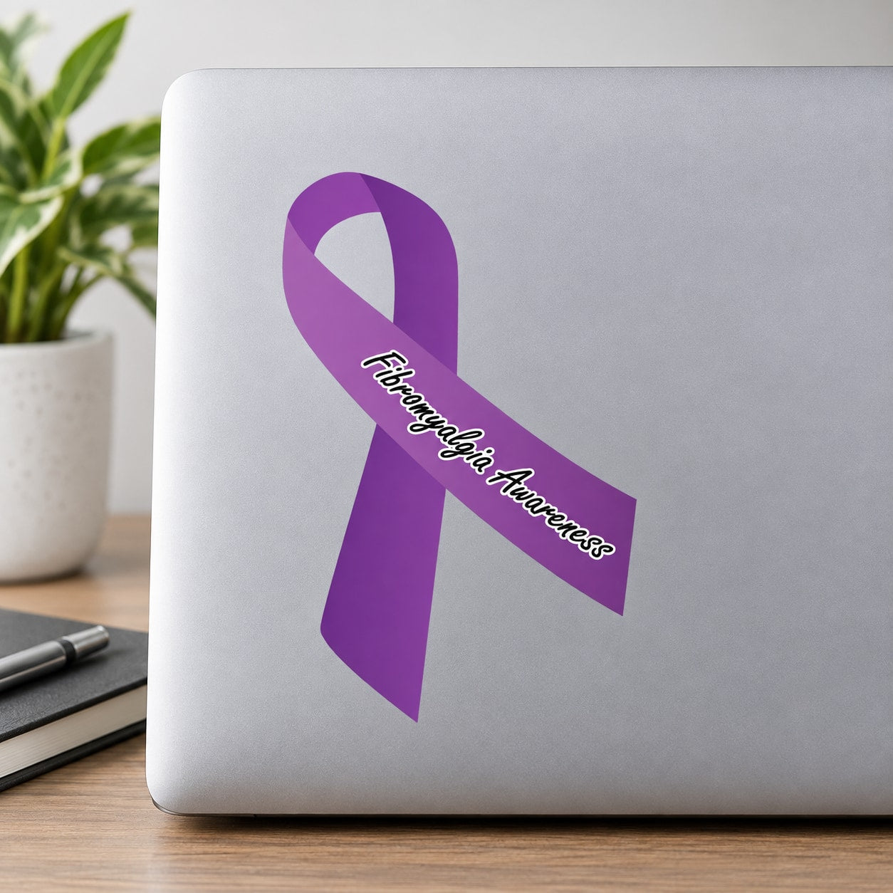 Purple fibromyalgia awareness ribbon vinyl sticker with white lettering across ribbon