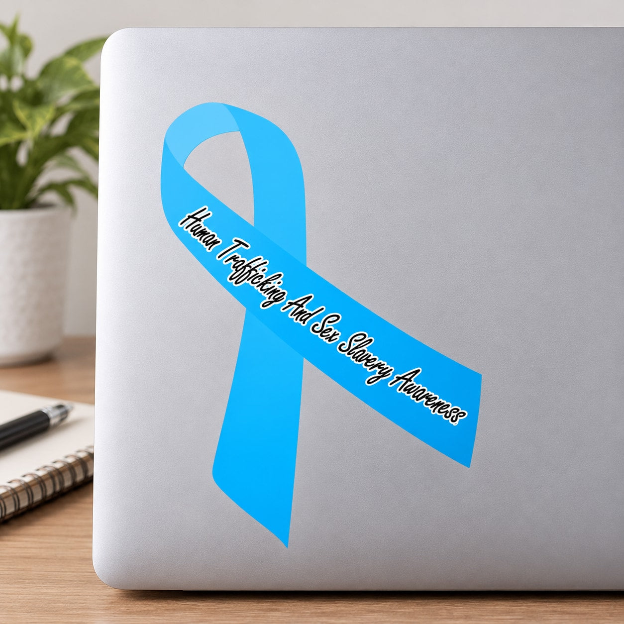 Blue awareness ribbon vinyl sticker with 'Stop Trafficking & Sex Slavery' text