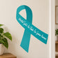 Teal awareness ribbon vinyl sticker with message printed across the ribbon