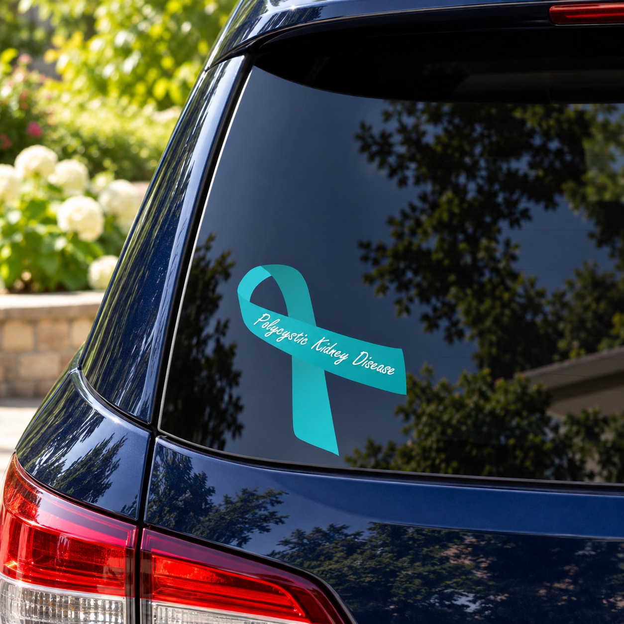 Vinyl sticker featuring teal awareness ribbon with small text banner