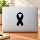 Black awareness ribbon decal, centered on light background.
