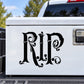 Black ornate RIP decal on a white rectangular panel