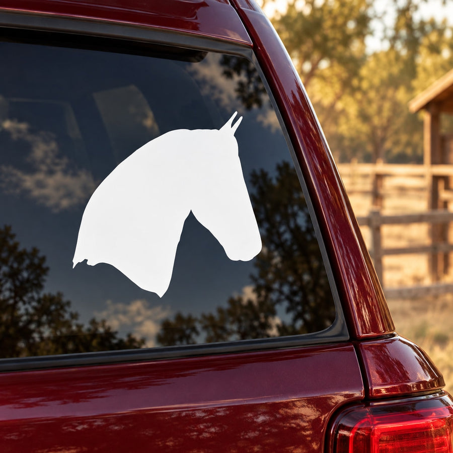 White horse head decal on a car side window