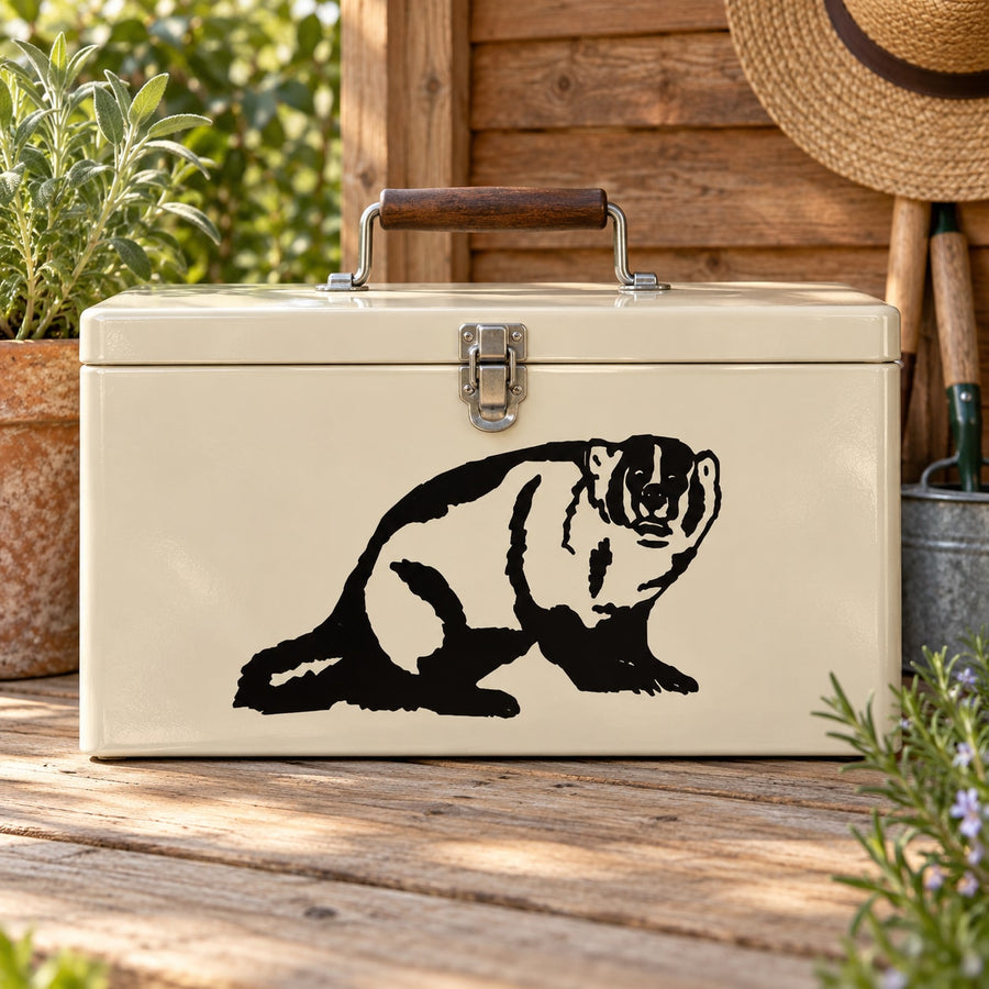 Black badger staring vinyl decal on cream surface