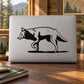 Wolf decal with three black wolf silhouettes on a light background